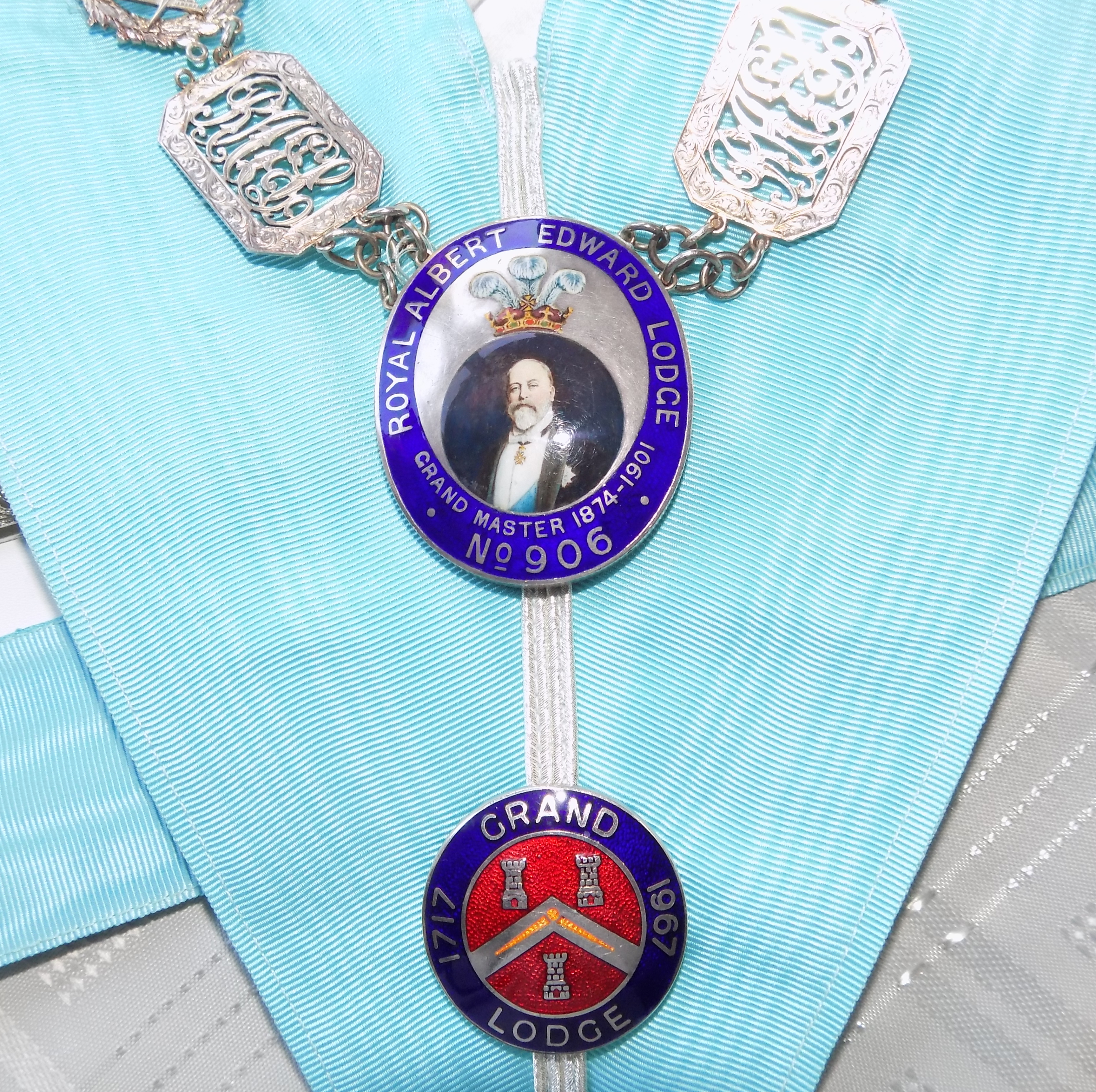 The medallions on the Royal Albert Edward Lodge's Worshipful Master's collar. A large one shows King Edward VII surrounded by the words 