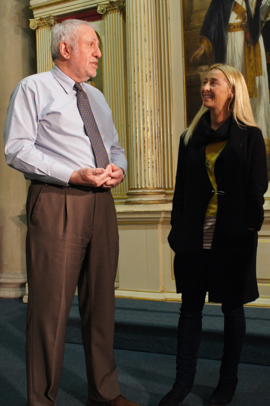 Malcolm Toogood guides Asher Keddie on the stage